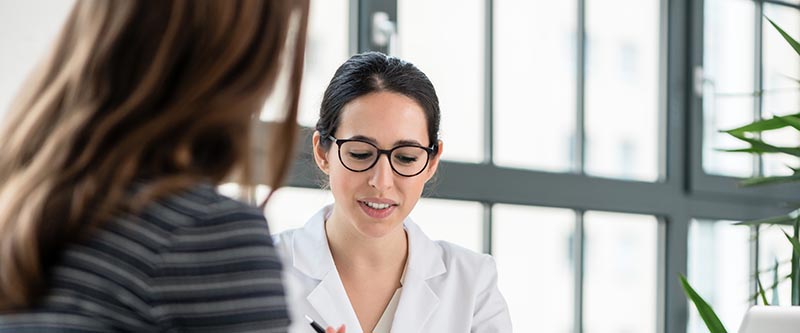 A doctor goes over medical information